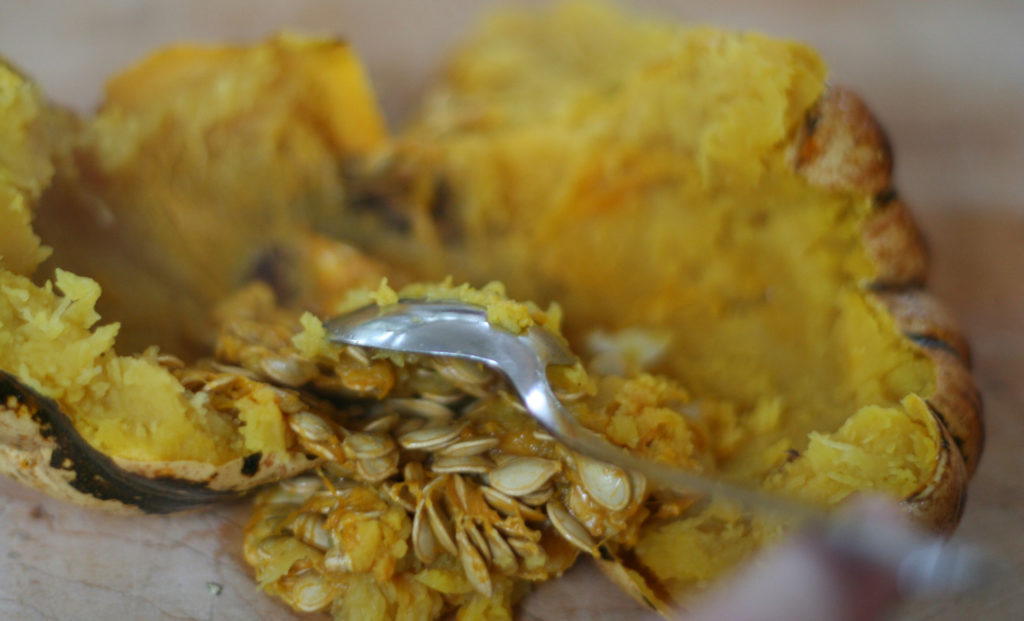 Scoop Seeds From Squash