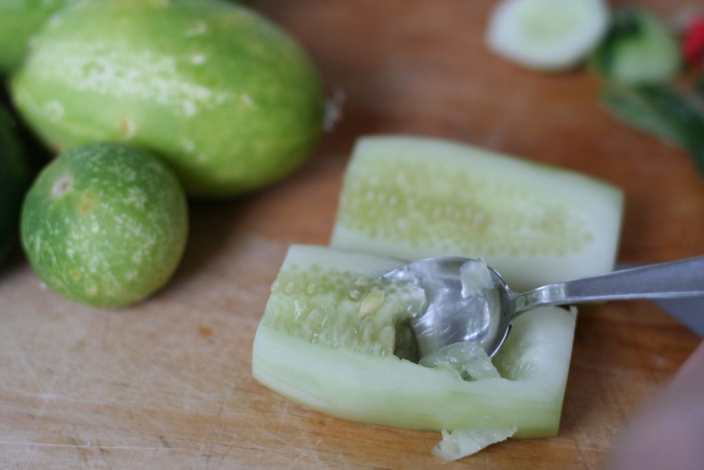Scoop Seeds From Cucumber